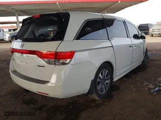 2016 Honda Odyssey Touring Elite with VIN 5FNRL5H91GB018212, listed as a IAAI auction lot 41691279 with 115,691 mi miles. Bid and sale history available at carsss.com. Image 4.