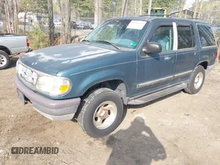 1997 Ford Explorer XL z VIN 1FMDU34E9VZB67632, wystawiony jako IAAI lot #41942102 z przebiegiem 295 240 mil mil oraz . Historia ofert i sprzedaży dostępna na DreamBid. Obrazek 2.
