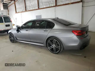 2017 BMW 7 Series 750i with VIN WBA7F0C31HGM22359, listed as a Copart auction lot 56306875 with 90,642 mi miles and Salvage title. Bid and sale history available at DreamBid. Image 2.