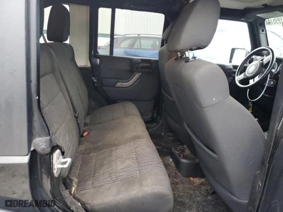 2012 Jeep Wrangler Unlimited Sport with VIN 1C4BJWDG2CL211414, listed as a Copart auction lot 83399674 with 165,617 mi miles and Non Repairable. Bid and sale history available at carsss.com. Image 11.
