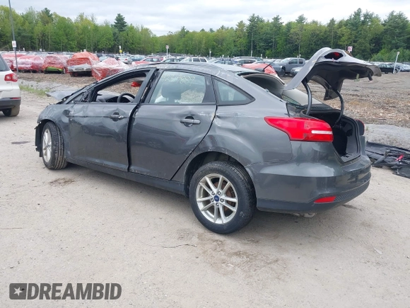 2016 Ford Focus SE z VIN 1FADP3F22GL327604, wystawiony jako IAAI lot #42319889 z przebiegiem 97 736 mil mil oraz . Historia ofert i sprzedaży dostępna na DreamBid. Obrazek 3.