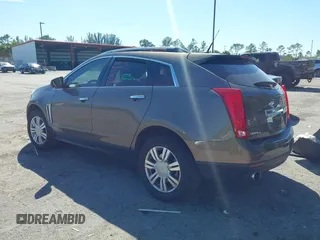 2014 Cadillac SRX Luxury Collection z VIN 3GYFNEE3XES587233, wystawiony jako IAAI lot #41747779 z przebiegiem 116 571 mil mil oraz . Historia ofert i sprzedaży dostępna na DreamBid. Obrazek 3.