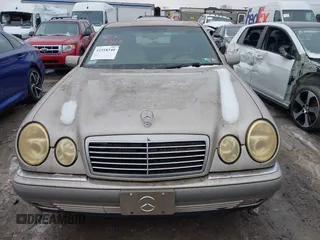 1996 Mercedes-Benz E-Class with VIN WDBJF55F5TJ007150, listed as a IAAI auction lot 41518340 with 178,930 mi miles. Bid and sale history available at carsss.com. Image 6.