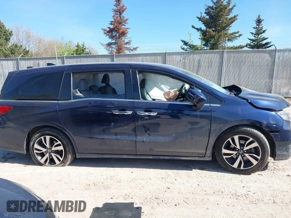 2020 Honda Odyssey Elite with VIN 5FNRL6H95LB052590, listed as a IAAI auction lot 42231280 with 65,165 mi miles and . Bid and sale history available at DreamBid. Image 14.