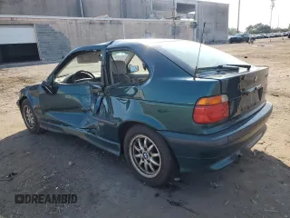 1997 BMW 3 Series 318tiA with VIN WBACG8321VAU39596, listed as a Copart auction lot 72657404 with 0 mi miles and Salvage Title. Bid and sale history available at carsss.com. Image 2.