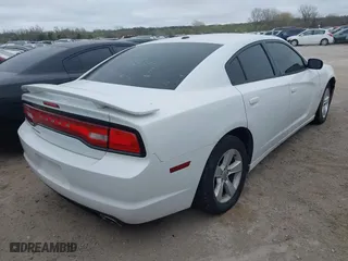 2013 Dodge Charger SXT Plus with VIN 2C3CDXHGXDH537220, listed as a IAAI auction lot 41905479 with 140,075 mi miles. Bid and sale history available at carsss.com. Image 4.