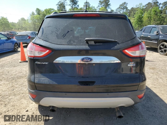 2016 Ford Escape SE with VIN 1FMCU9GX8GUC44728, listed as a Copart auction lot 52693855 with 99,224 mi miles and Salvage Title. Bid and sale history available at DreamBid. Image 6.