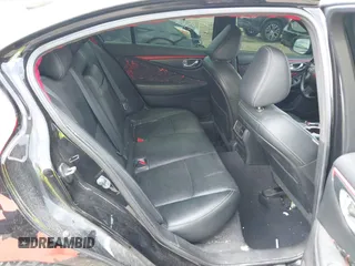2015 Infiniti Q50 Premium z VIN JN1BV7AR8FM398319, wystawiony jako IAAI lot #42170789 z przebiegiem 86 108 mil mil oraz . Historia ofert i sprzedaży dostępna na DreamBid. Obrazek 8.