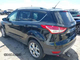 2015 Ford Escape Titanium with VIN 1FMCU0JX3FUB39808, listed as a IAAI auction lot 42212271 with 136,488 mi miles and . Bid and sale history available at DreamBid. Image 3.
