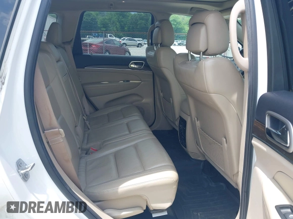 2017 Jeep Grand Cherokee Limited z VIN 1C4RJEBG4HC736087, wystawiony jako IAAI lot #42491605 z przebiegiem 150 465 mil mil oraz . Historia ofert i sprzedaży dostępna na DreamBid. Obrazek 8.