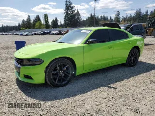2023 Dodge Charger SXT z VIN 2C3CDXBGXPH592389, wystawiony jako Copart lot #54956945 z przebiegiem 17 876 mil mil oraz Szkody całkowita. Historia ofert i sprzedaży dostępna na DreamBid. Obrazek 1.