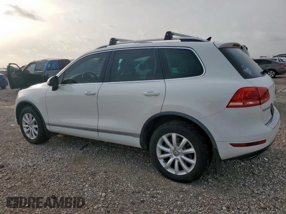 2012 Volkswagen Touareg Sport z VIN WVGEF9BP4CD007058, wystawiony jako Copart lot #56971745 z przebiegiem 181 221 mil mil oraz Czysty tytuł • Clean title. Historia ofert i sprzedaży dostępna na DreamBid. Obrazek 2.
