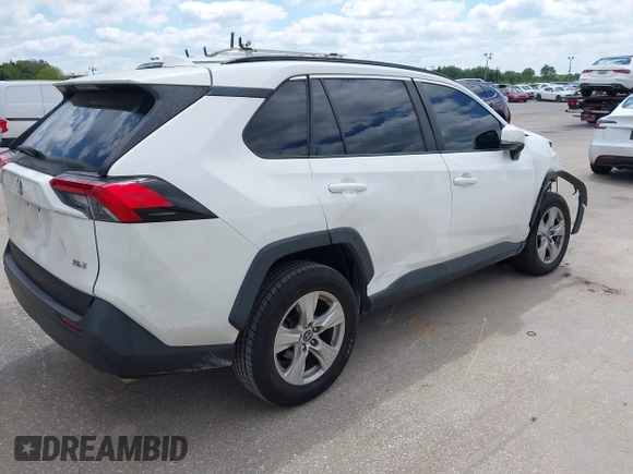 2019 Toyota RAV4 XLE with VIN 2T3W1RFVXKW033696, listed as a IAAI auction lot 42044151 with 126,872 mi miles and . Bid and sale history available at DreamBid. Image 4.
