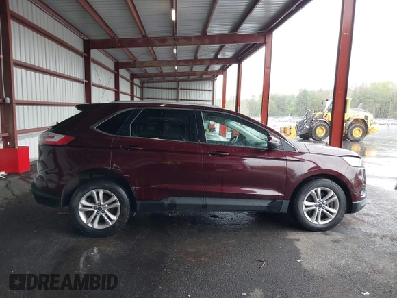 2019 Ford Edge SEL z VIN 2FMPK4J96KBB18838, wystawiony jako IAAI lot #42237001 z przebiegiem 72 875 mil mil oraz . Historia ofert i sprzedaży dostępna na DreamBid. Obrazek 13.
