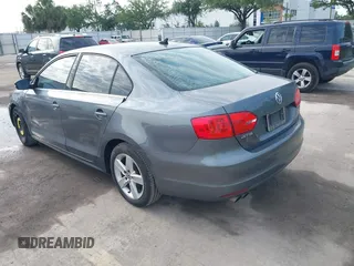 2014 Volkswagen Jetta TDI with VIN 3VWLL7AJ0EM386019, listed as a IAAI auction lot 42229260 with 122,858 mi miles and . Bid and sale history available at DreamBid. Image 3.