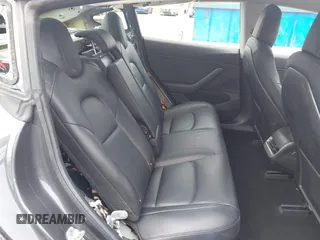 2018 Tesla Model 3 Long Range Battery with VIN 5YJ3E1EA8JF059385, listed as a IAAI auction lot 42116589 with 63,630 mi miles and . Bid and sale history available at DreamBid. Image 8.