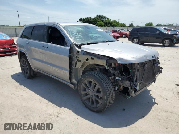 2018 Jeep Grand Cherokee Laredo with VIN 1C4RJFAG4JC272683, listed as a Copart auction lot 56823455 with 122,778 mi miles and Salvage title. Bid and sale history available at DreamBid. Image 4.