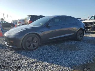 2023 Tesla Model 3 with VIN 5YJ3E1EAXPF704742, listed as a Copart auction lot 86323624 with 4,401 mi miles and Salvage Title. Bid and sale history available at carsss.com. Image 1.