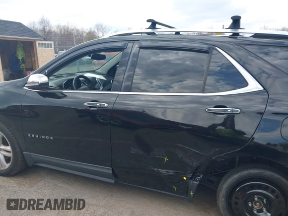 2018 Chevrolet Equinox Premier with VIN 2GNAXWEX6J6302935, listed as a IAAI auction lot 42065883 with 61,983 mi miles and . Bid and sale history available at carsss.com. Image 14.