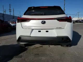 2019 Lexus UX 200 z VIN JTHY3JBH7K2004720, wystawiony jako Copart lot #55961755 z przebiegiem 62 908 mil mil oraz Szkody całkowita. Historia ofert i sprzedaży dostępna na DreamBid. Obrazek 6.