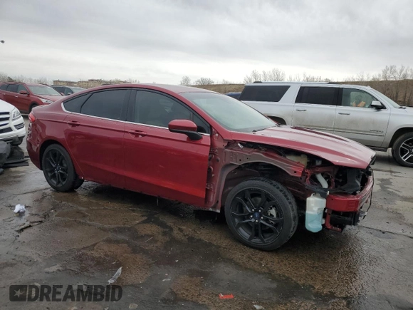 2019 Ford Fusion SE with VIN 3FA6P0HD7KR162259, listed as a Copart auction lot 49509425 with 98,429 mi miles and Salvage Title. Bid and sale history available at DreamBid. Image 4.