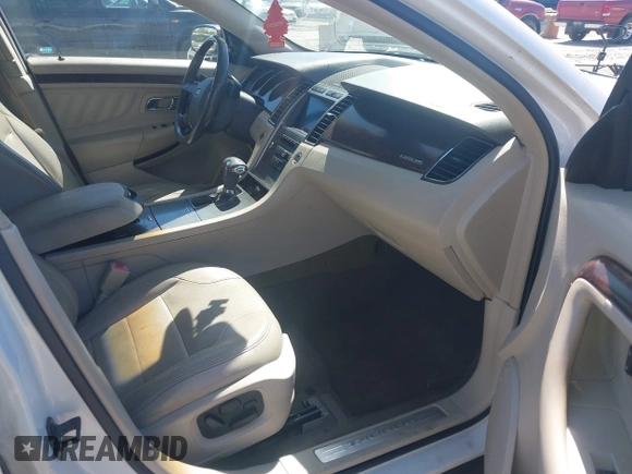 2011 Ford Taurus Limited with VIN 1FAHP2FW1BG121044, listed as a IAAI auction lot 41864054 with 217,929 mi miles and . Bid and sale history available at carsss.com. Image 5.