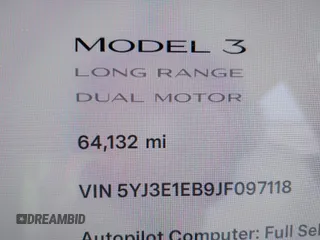 2018 Tesla Model 3 Long Range Battery with VIN 5YJ3E1EB9JF097118, listed as a IAAI auction lot 41619510 with 64,132 mi miles and . Bid and sale history available at DreamBid. Image 16.