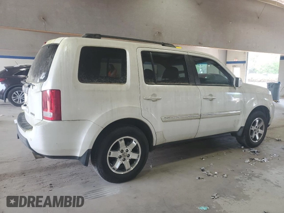2011 Honda Pilot Touring z VIN 5FNYF3H91BB035074, wystawiony jako Copart lot #54789885 z przebiegiem 196 234 mil mil oraz Czysty tytuł • Clean title. Historia ofert i sprzedaży dostępna na DreamBid. Obrazek 3.
