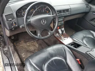 1999 Mercedes-Benz SL-Class with VIN WDBFA68F0XF184008, listed as a Copart auction lot 84998014 with 74,809 mi miles and Salvage Title. Bid and sale history available at carsss.com. Image 8.
