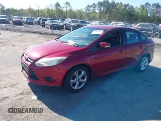 2014 Ford Focus SE with VIN 1FADP3F27EL202224, listed as a IAAI auction lot 42067644 with 174,674 mi miles. Bid and sale history available at carsss.com. Image 2.