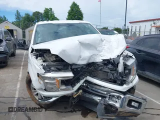 2019 Ford F-150 XL with VIN 1FTEW1E53KFD17091, listed as a IAAI auction lot 42320554 with 166,961 mi miles and . Bid and sale history available at DreamBid. Image 12.