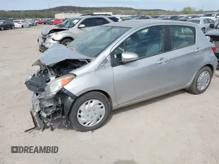 2013 Toyota Yaris L with VIN JTDKTUD37DD568028, listed as a IAAI auction lot 41885722 with 149,624 mi miles. Bid and sale history available at carsss.com. Image 2.