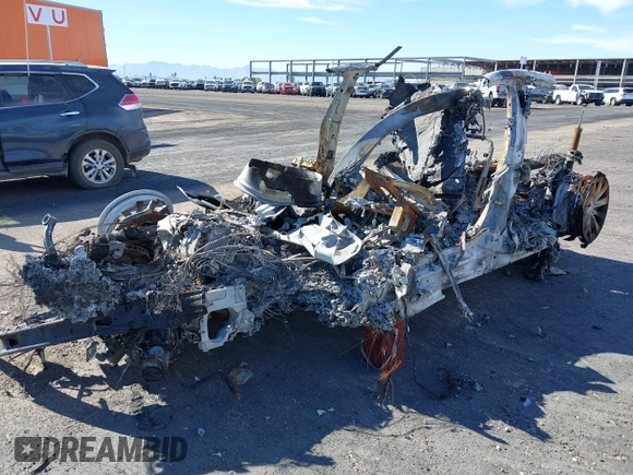 2017 Tesla Model S 100D with VIN 5YJSA1E21HF217043, listed as a IAAI auction lot 37690137 with Not Provided miles and . Bid and sale history available at DreamBid. Image 2.