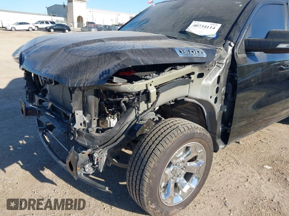 2022 Ram 1500 Big Horn with VIN 1C6RREBT3NN442466, listed as a IAAI auction lot 40734114 with 22,586 mi miles and . Bid and sale history available at DreamBid. Image 6.