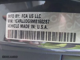2021 Jeep Grand Cherokee L Overland with VIN 1C4RJJDG9M8160287, listed as a IAAI auction lot 41523034 with 50,142 mi miles. Bid and sale history available at carsss.com. Image 9.