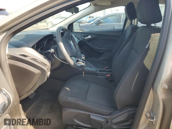 2016 Ford Focus SE with VIN 1FADP3F25GL256592, listed as a Copart auction lot 61739785 with 57,626 mi miles and Salvage title. Bid and sale history available at DreamBid. Image 7.