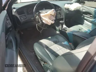 1996 Ford Thunderbird LX z VIN 1FALP62WXTH177910, wystawiony jako Copart lot #70954694 z przebiegiem 86 316 mil mil oraz Szkoda całkowita • Salvage title. Historia ofert i sprzedaży dostępna na DreamBid. Obrazek 8.