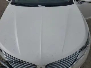 2014 Lincoln MKZ z VIN 3LN6L2GK9ER825882, wystawiony jako Copart lot #53332435 z przebiegiem 114 677 mil mil oraz Szkoda całkowita • Salvage title. Historia ofert i sprzedaży dostępna na DreamBid. Obrazek 11.