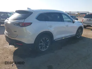 2016 Mazda CX-9 Grand Touring z VIN JM3TCADY6G0125547, wystawiony jako IAAI lot #41997445 z przebiegiem 129 179 mil mil oraz . Historia ofert i sprzedaży dostępna na DreamBid. Obrazek 4.