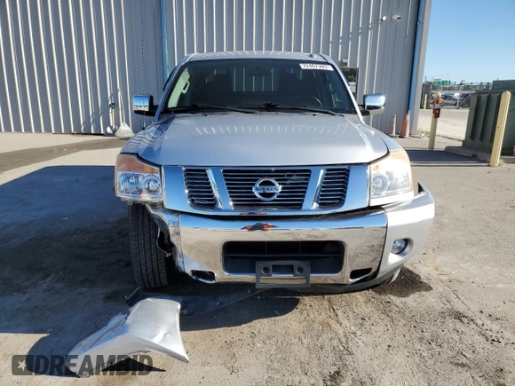 2015 Nissan Titan SV z VIN 1N6BA0ED7FN506693, wystawiony jako Copart lot #72467303 z przebiegiem 46 260 mil mil oraz Szkoda całkowita • Salvage title. Historia ofert i sprzedaży dostępna na DreamBid. Obrazek 5.