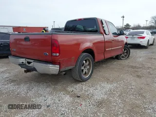 2001 Ford F-150 XL z VIN 1FTRX17W61NA63398, wystawiony jako IAAI lot #41882852 z przebiegiem 179 573 mil mil oraz . Historia ofert i sprzedaży dostępna na DreamBid. Obrazek 4.