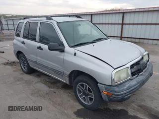 2003 Chevrolet Tracker z VIN 2CNBE134736919970, wystawiony jako IAAI lot #42203446 z przebiegiem 158 872 mil mil oraz . Historia ofert i sprzedaży dostępna na DreamBid. Obrazek 1.