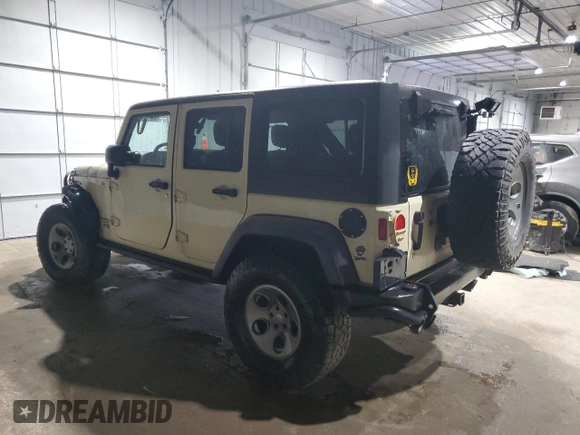 2012 Jeep Wrangler Unlimited Call of Duty MW3 with VIN 1C4BJWFGXCL105130, listed as a Copart auction lot 85747614 with 77,953 mi miles and Salvage title. Bid and sale history available at DreamBid. Image 2.