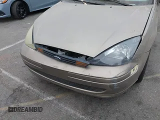 2003 Ford Focus SE z VIN 1FAFP34Z73W236474, wystawiony jako IAAI lot #39378102 z przebiegiem 183 280 mil mil oraz . Historia ofert i sprzedaży dostępna na DreamBid. Obrazek 12.