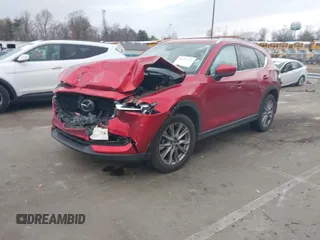 2020 Mazda CX-5 Grand Touring with VIN JM3KFADMXL0842026, listed as a IAAI auction lot 41477339 with 60,755 mi miles. Bid and sale history available at carsss.com. Image 17.