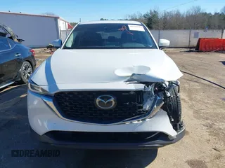 2023 Mazda CX-5 2.5 S Preferred Package with VIN JM3KFBCM6P0140427, listed as a IAAI auction lot 41335811 with 42,713 mi miles. Bid and sale history available at carsss.com. Image 13.