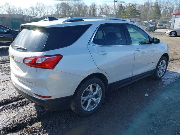 2020 Chevrolet Equinox LT with VIN 3GNAXVEXXLS738735, listed as a IAAI auction lot 41609011 with 70,636 mi miles. Bid and sale history available at carsss.com. Image 4.