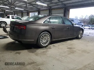 2015 Audi A8 L 4.0T with VIN WAU32AFD0FN032818, listed as a Copart auction lot 43286465 with 125,798 mi miles and Salvage Title. Bid and sale history available at carsss.com. Image 3.