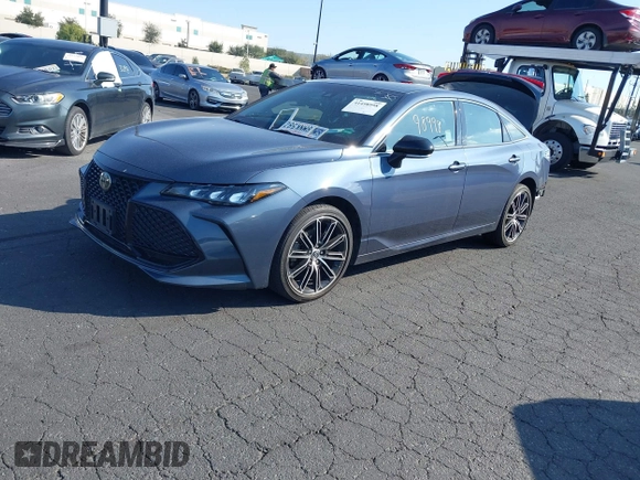 2019 Toyota Avalon XLE z VIN 4T1BZ1FB5KU030812, wystawiony jako IAAI lot #41498998 z przebiegiem 31 986 mil mil oraz . Historia ofert i sprzedaży dostępna na DreamBid. Obrazek 2.