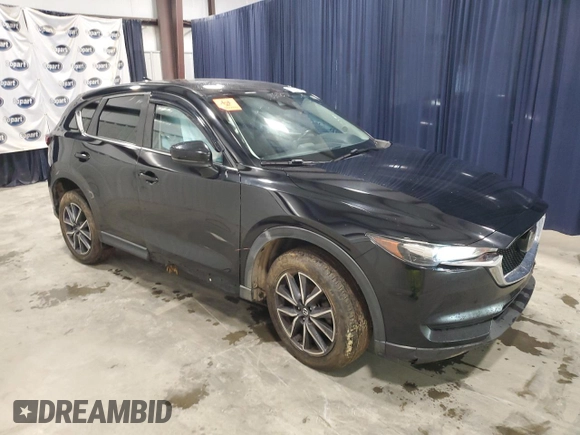 2018 Mazda CX-5 Touring with VIN JM3KFACM7J1452929, listed as a Copart auction lot 51945625 with 93,133 mi miles and Clean Title. Bid and sale history available at carsss.com. Image 4.
